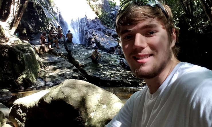 brad in front of waterfall
