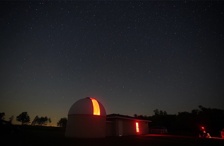 Photo of the Menke Observatory at night