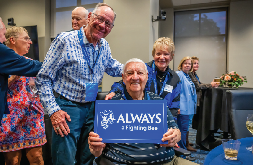 Dr Rogalski and two alumni
