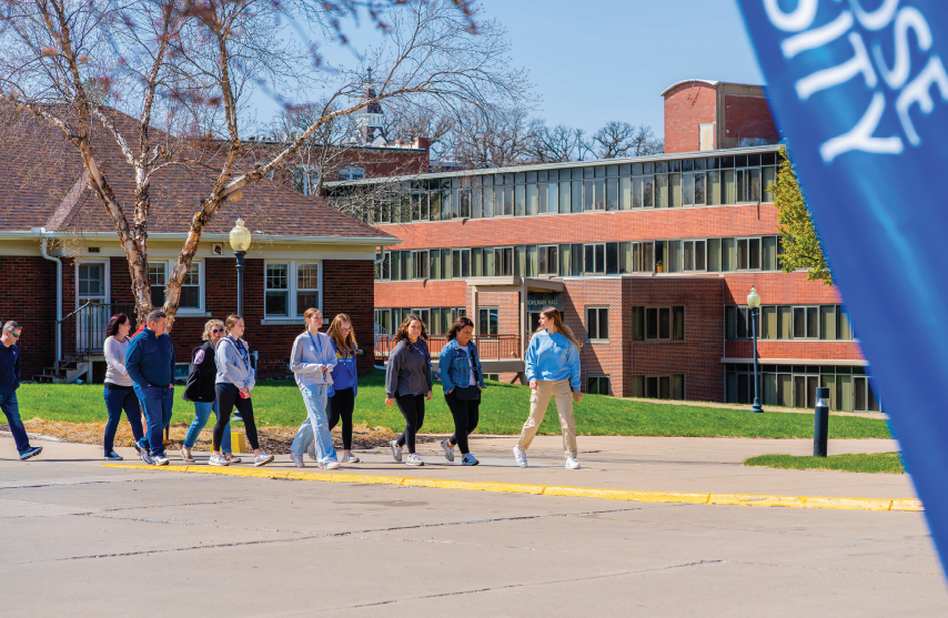 Large group of students on a campus tour