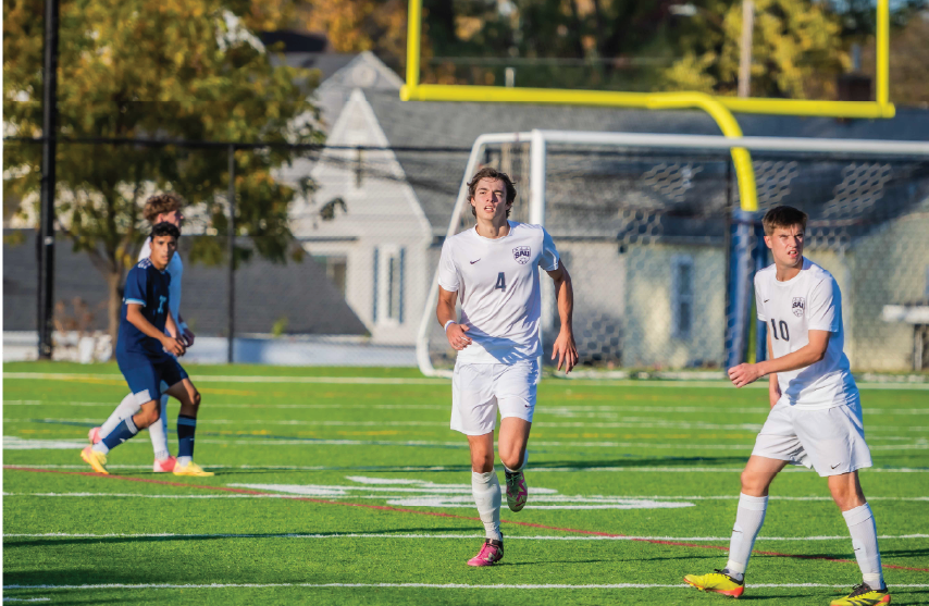 Male soccer player running on the field