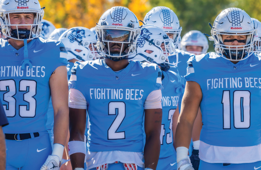 SAU football players walking to the field