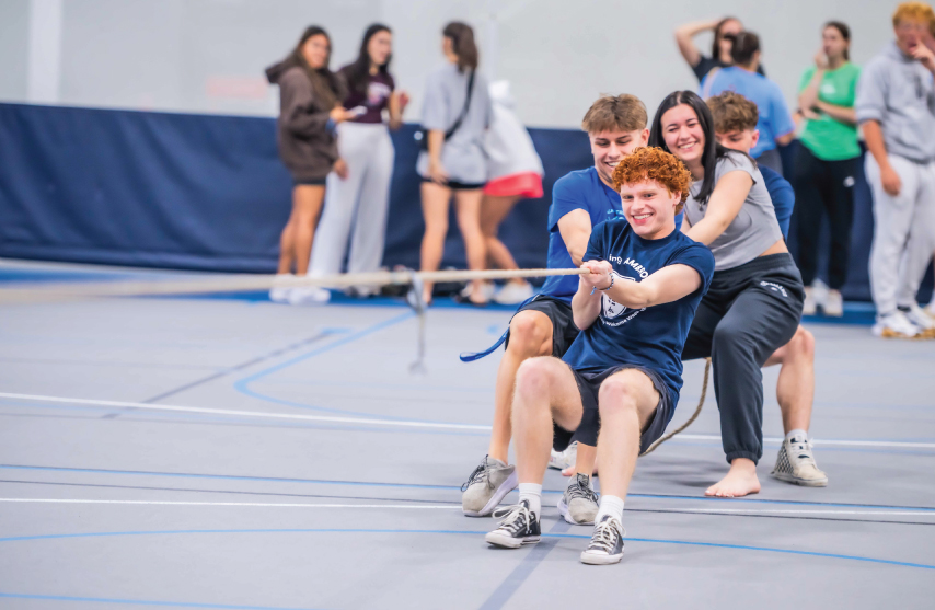 Group of students playing tug-o-war