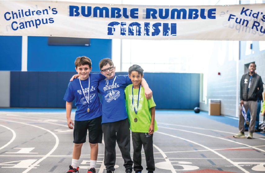 three kids finishing the bumble rumble race
