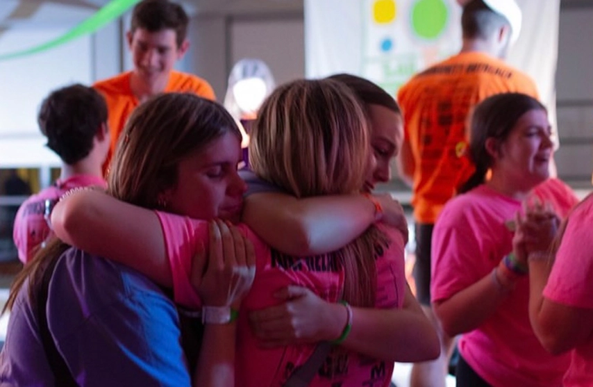 Student celebrate together after hosting the St. Ambrose University dance marathon.