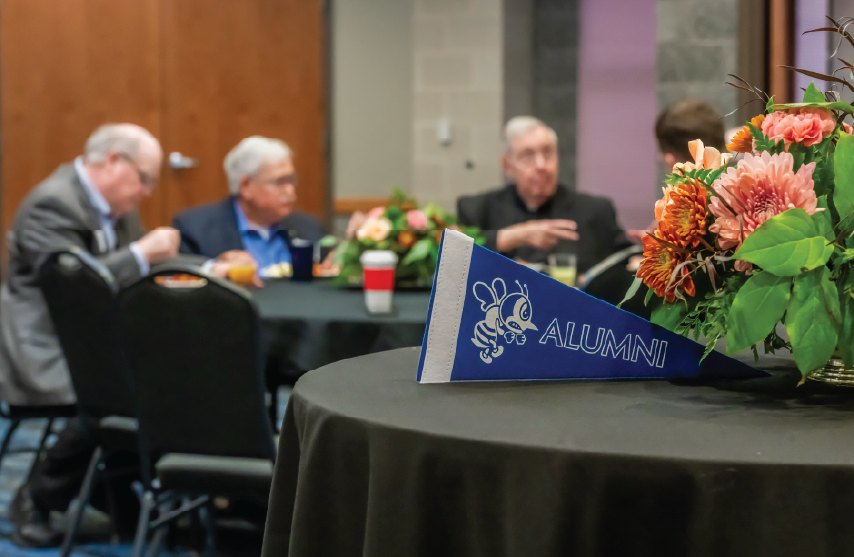 Alumni pennant flag on a table