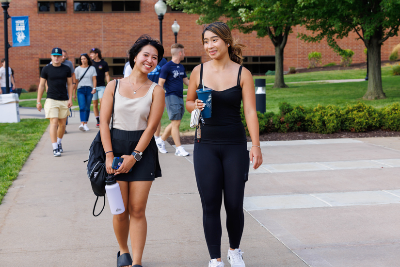students walking outside campus