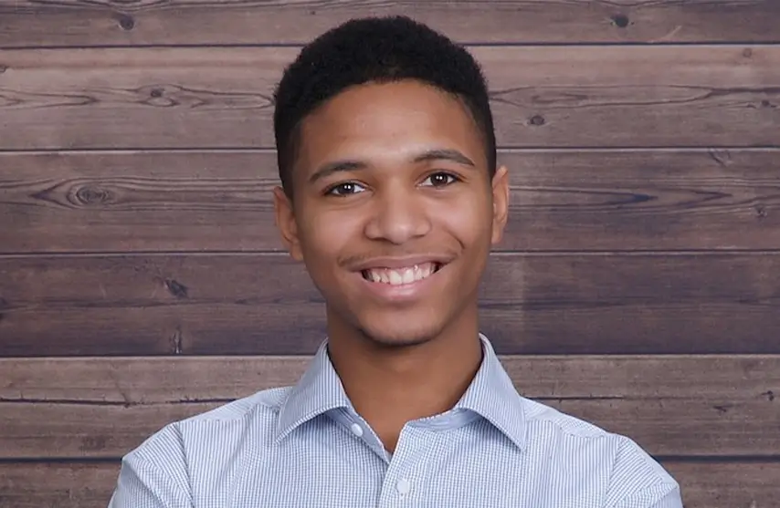A smiling young man.