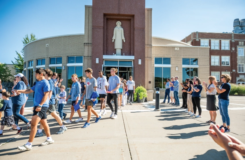 Students walking out the chapel.