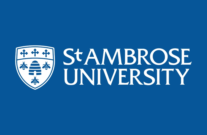 White St. Ambrose University wordmark with shield against SAU Blue background.