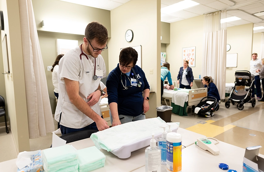 Student doctors practice clincals.
